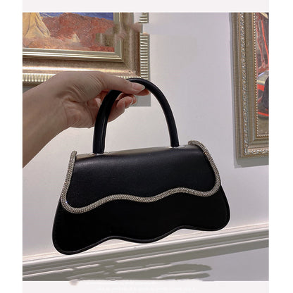 used as an evening bag or clutch for a night out or dinner.